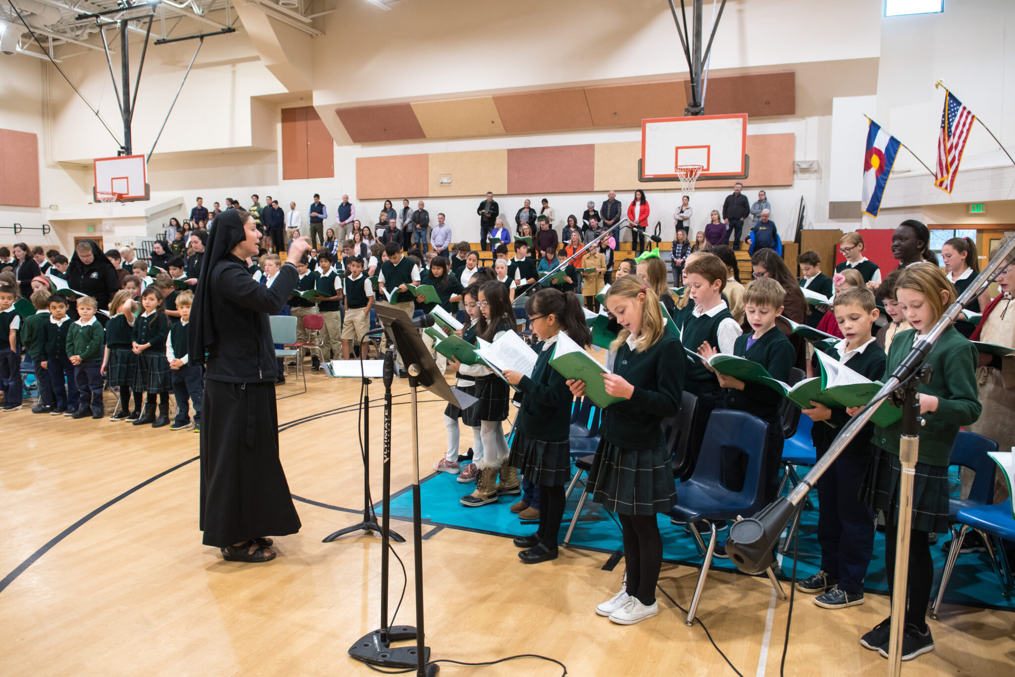 School choir performing in gymnasium