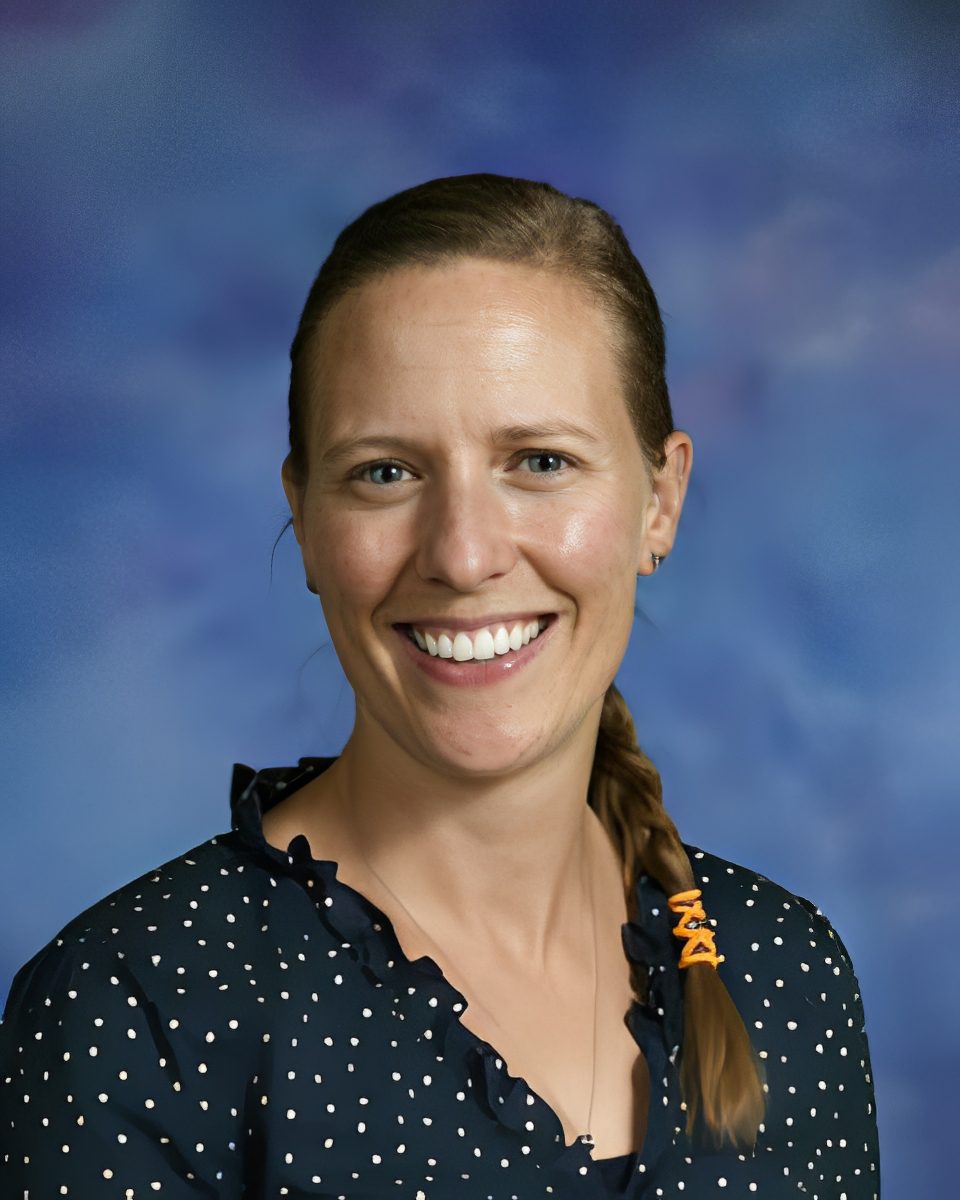 Woman in polka dot blouse
