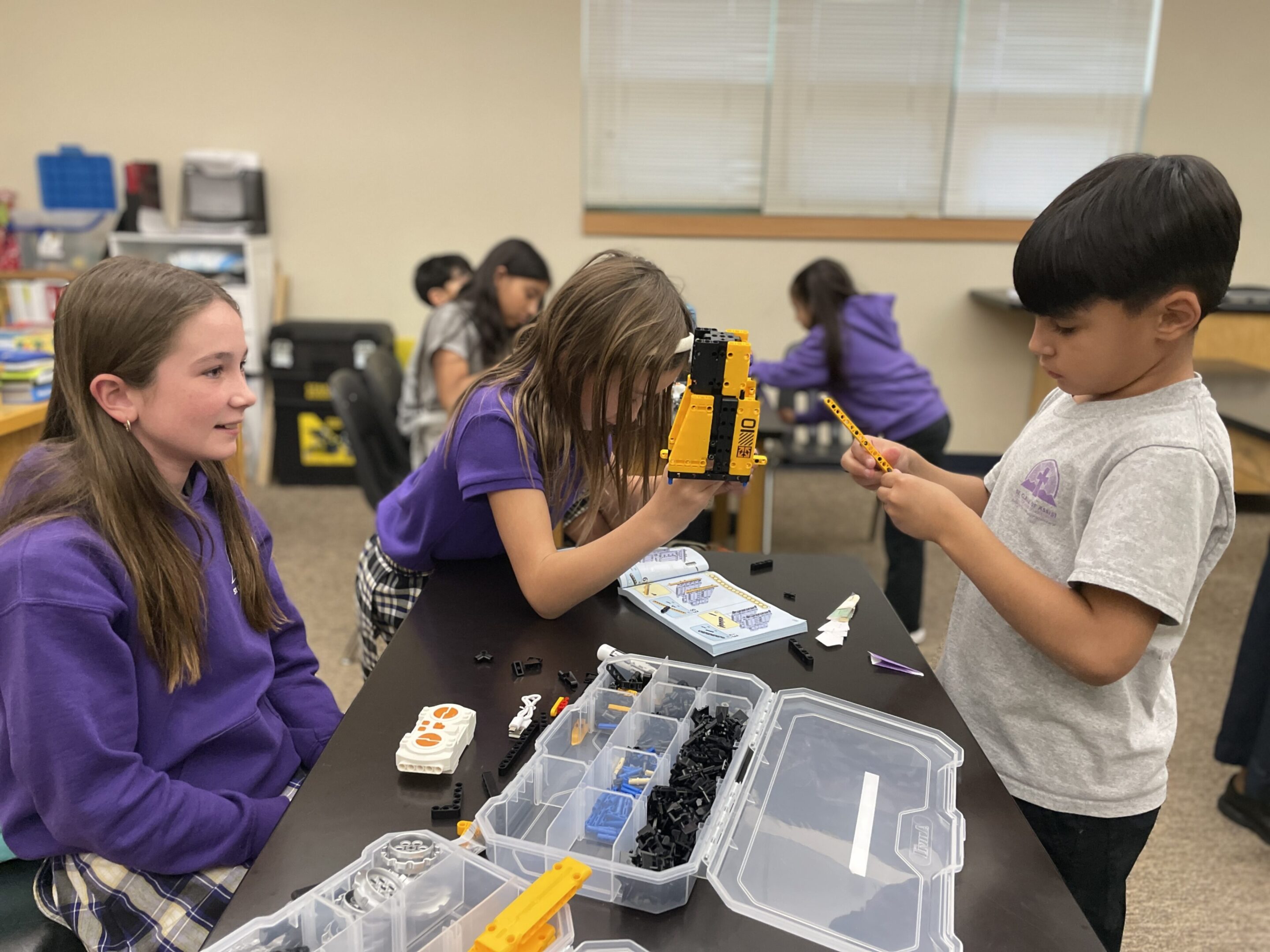 Children engaging in a science activity using microscopes and tools.